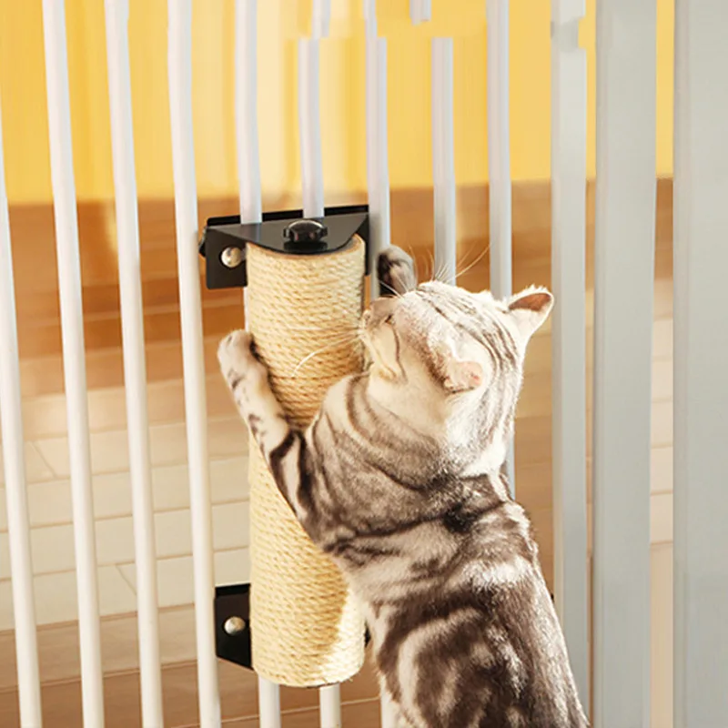 Tabby cat scratching a sisal post fixed to stair railings