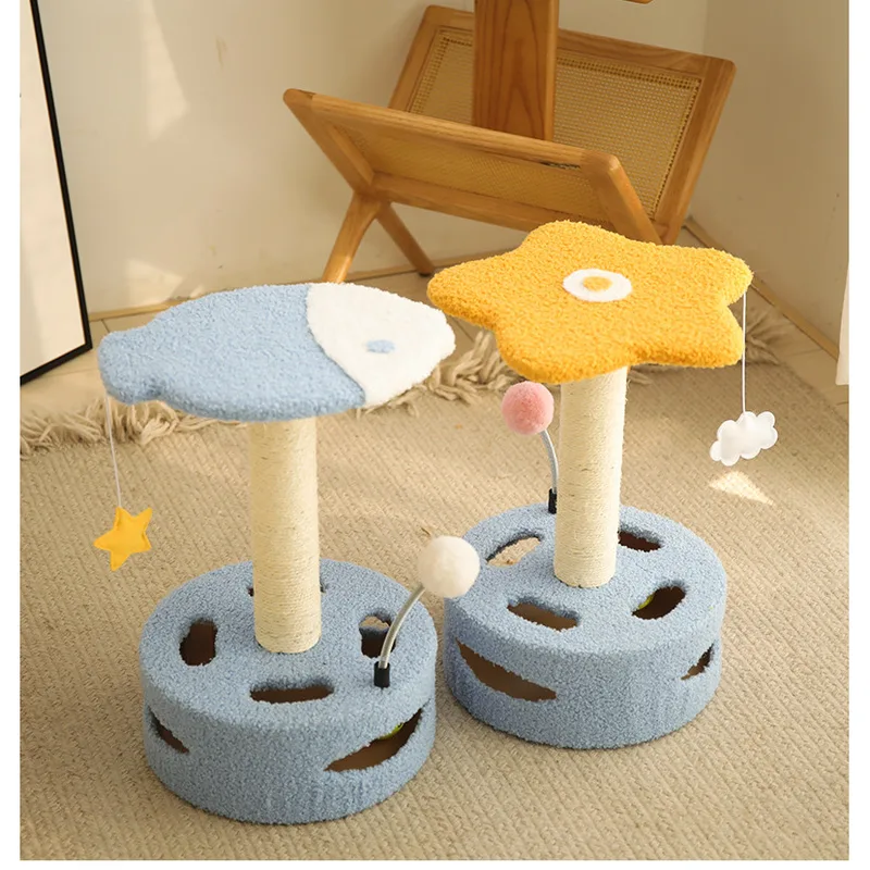 Mini cat trees in soft colours by a window
